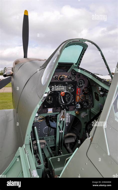 Cockpit of a Second World War Supermarine Spitfire Mk.I fighter plane. Instrument panel, control ...