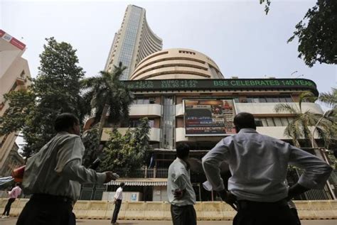 Sensex Surges Over 200 Points Nifty Reclaims 10700 Mark