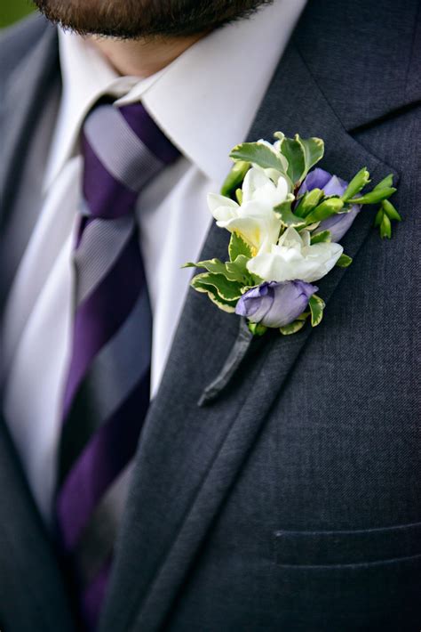 White And Purple Boutonniere