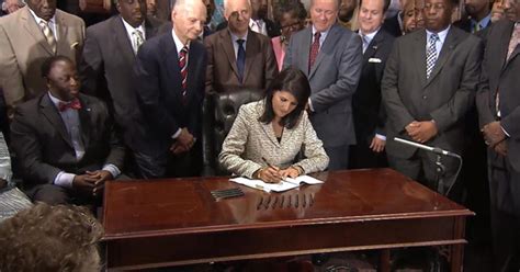 Gov. Nikki Haley signs bill to take down Confederate flag - CBS News