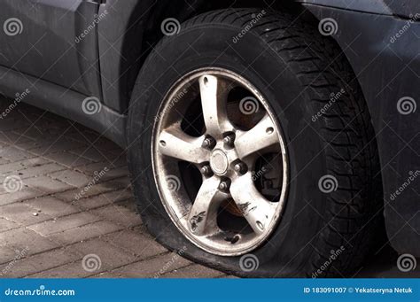 Car Wheel Flat Tire On The Road Road Accident Stock Image Image Of