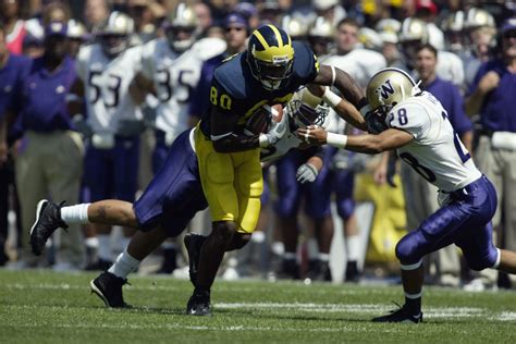 Washington Huskies Vs Michigan Wolverines Free Pick Cfp Odds