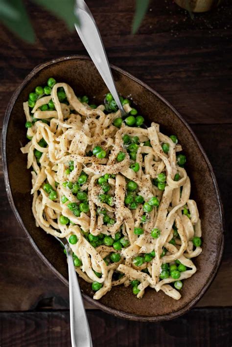 Garlicky Pea Pasta With Cream Sauce Naturally Recipe White Sauce Recipes Cream Sauce