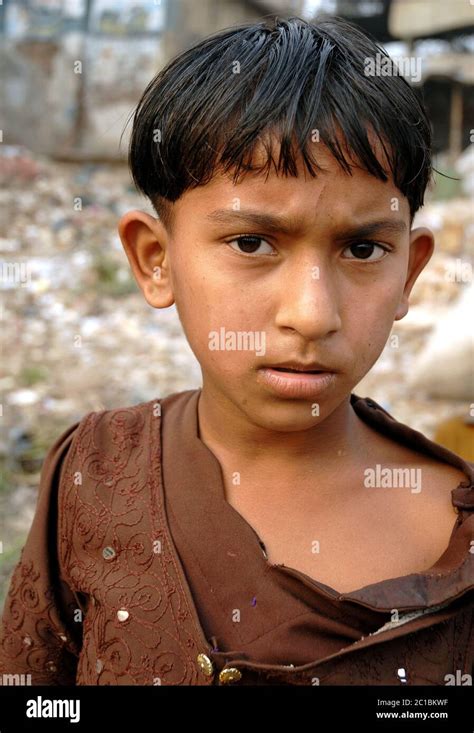 A Young Boy In The Streets Of Dhaka Bangladesh The Boy Is In The Area