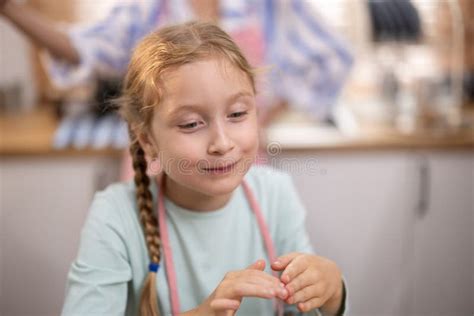 An Enthusiastic Girl Makes A Funny Quirky And Grimacing Face Innocent