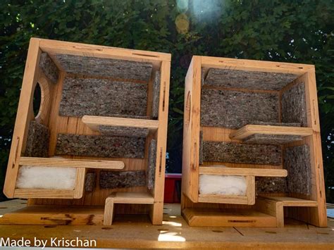 There Are Two Wooden Shelves Made Out Of Wood