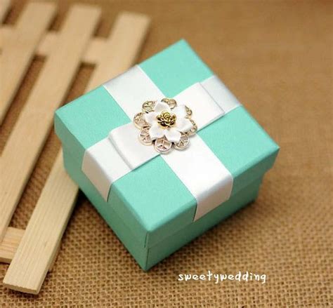 Tiffany Blue Wedding Favor Box With Cross In White Satin Ribbon And White Gold Resin Flower