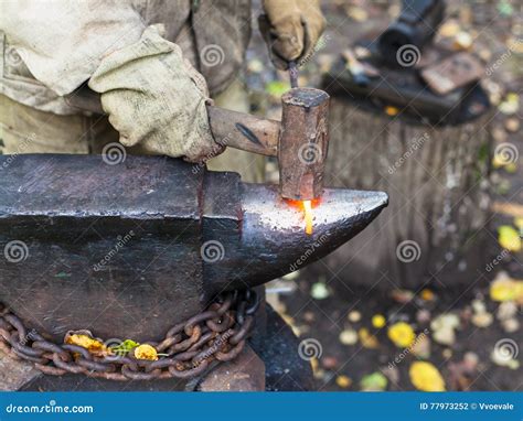 Blacksmith Processing Red Hot Iron Rod On Anvil Stock Photo Image Of