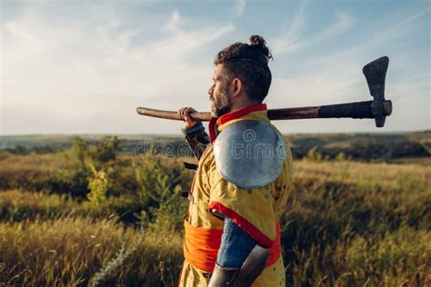 Medieval Knight With Axe Poses In Armor Stock Image Image Of Courage