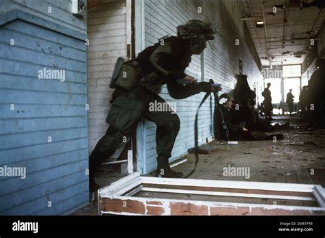 A Soldier From The 2187th Airborne Attacks An Enemy Building At