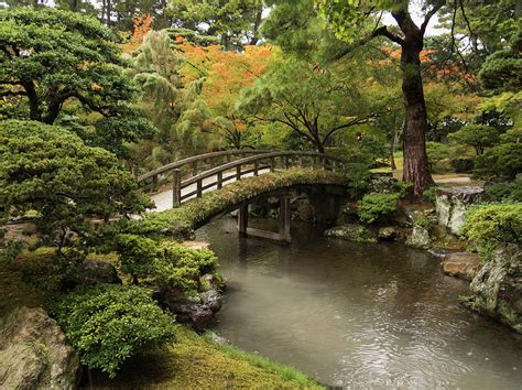 Japanese Stone Bridge Across A Stream Photograph By Philippe Widling