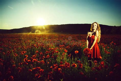 Opium Woman Or Girl In Flower Field Of Poppy Seed Stock Photo Image