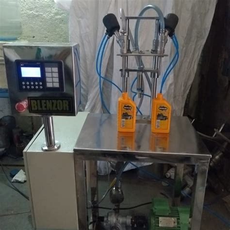 Digital Double Head Edible Oil Filling Machine Manufacturer