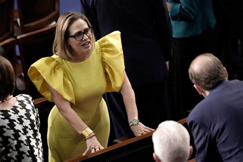 Sen. Kyrsten Sinema's yellow dress at State of the Union draws mockery ...