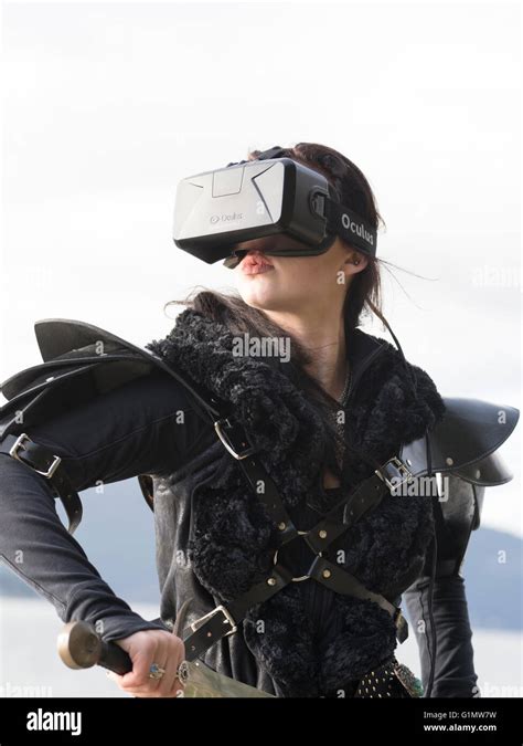 Conceptual Picture Of A Young Woman Wearing Costume And Oculus Rift