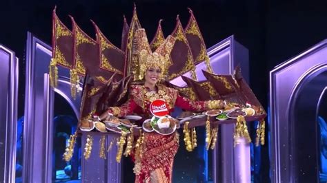 Pesona Nova Liana Di Malam Preliminary Miss Grand Internasional Dengan