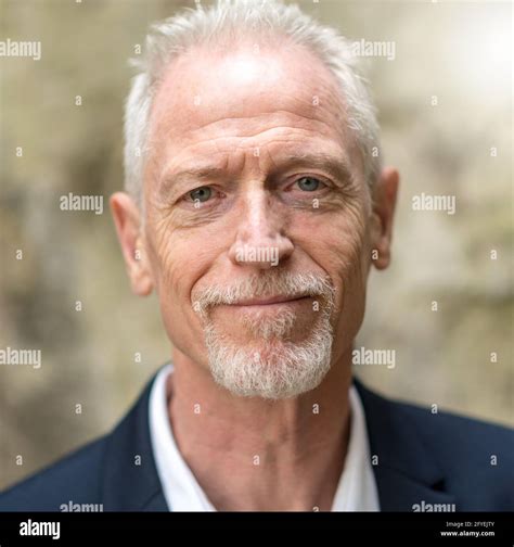 Portrait Of Handsome Mature Man Outdoors Light Effect Stock Photo Alamy