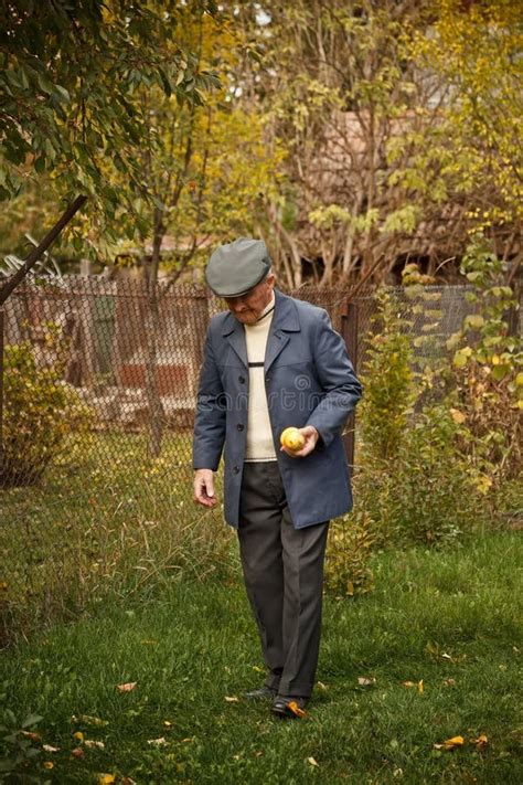 Old Man Walking In The Park Stock Photo Image Of Outdoor Retirement