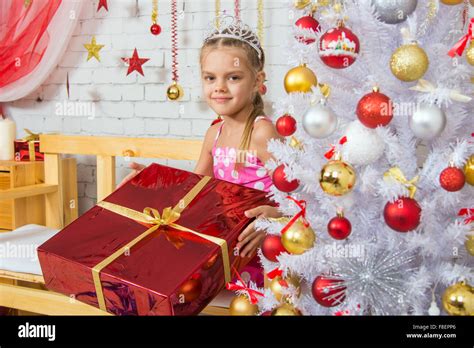 Six Year Old Girl Standing At The Shop With A Small T From Snowy