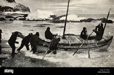 Launching the James Caird on the relief voyage to South Georgia during ...