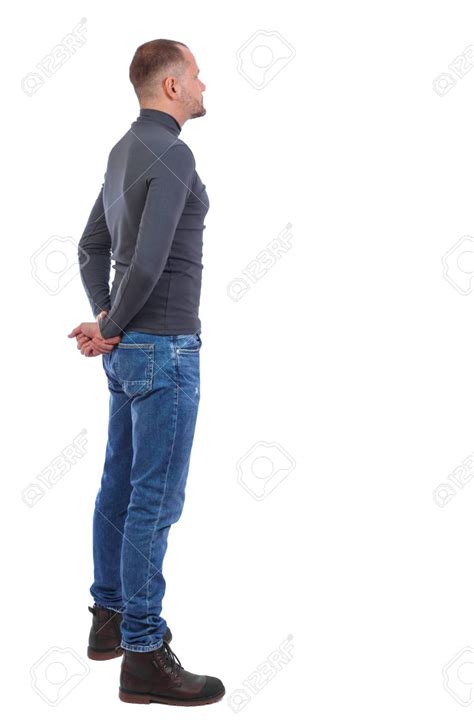 Back View Of Man In Jeans Standing Young Guy Rear View People