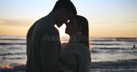 Silhouette Couple And Travel Sunset At The Beach And Love With