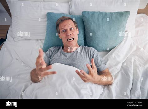 Angry Mature Male Person Staring At Camera Stock Photo Alamy