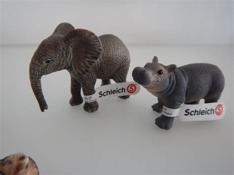 Schleich Gruppe mit Jungtieren Erdmännchen Nilpferd Neu Kaufen