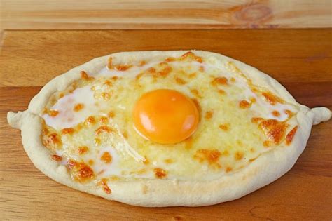 Premium Photo Homemade Adjarian Khachapuri Cheese And Egg Filled