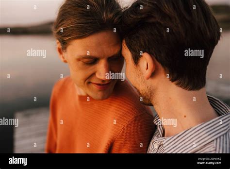 Gay Couple Doing Romance At Lakeshore Stock Photo Alamy