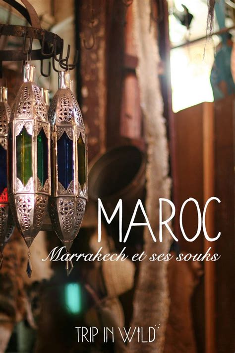 An Advertisement For Maroc With Three Hanging Lanterns