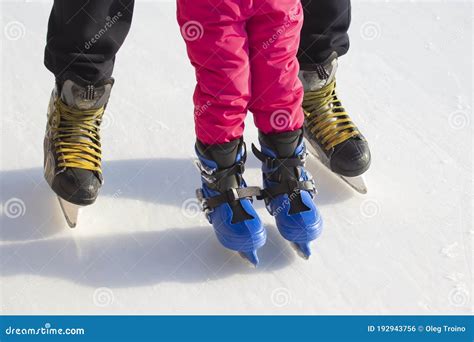 People Ice Skating On An Ice Rink Hobbies And Leisure Stock Photo