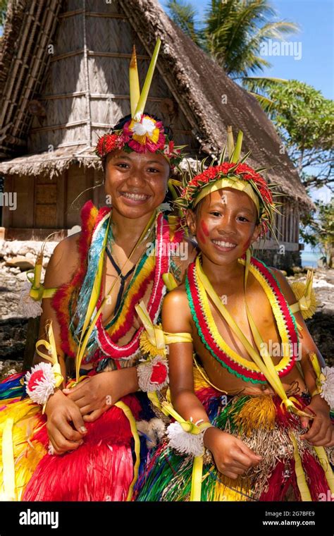 Girl and boy decorated for traditional bamboo dance, Yap Island, Yap ...