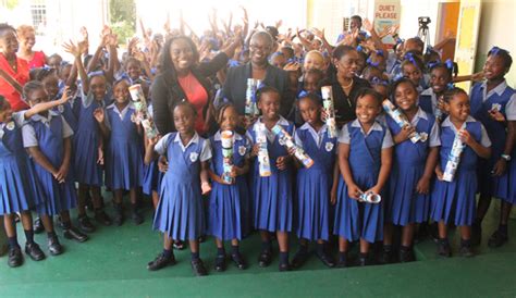 axcel finance giving   schools barbados advocate