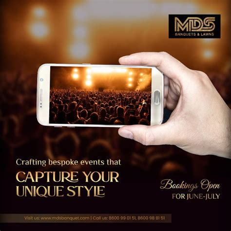 a person holding up a cell phone to take a picture with an audience in ...