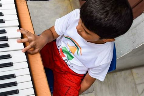 Child Playing Piano Stock Photos, Images and Backgrounds for Free Download