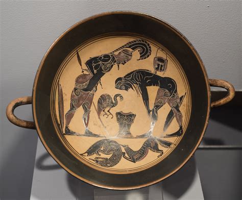 Laconian Black Figure Kylix Representing Two Warriors Arming With