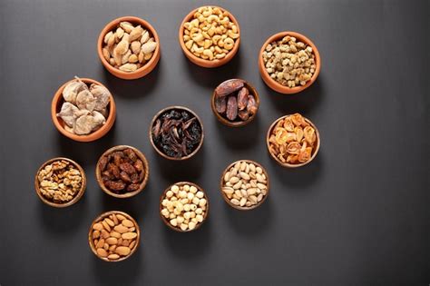 Premium Photo Dried Fruits And Mixed Nuts Healthy Foods