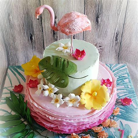 mon gateau décoré sur le thème flamant rose les decors sont