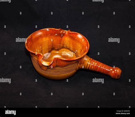 a left side of a handmade gravy boat Stock Photo - Alamy