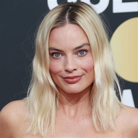 Margot Robbie Flashes Her Abs In A Black Peek A Boo Crop Top At The