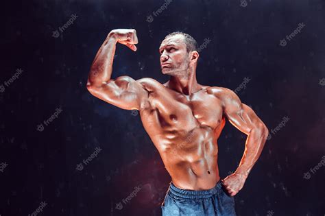 Premium Photo Strong Bald Bodybuilder With Six Pack