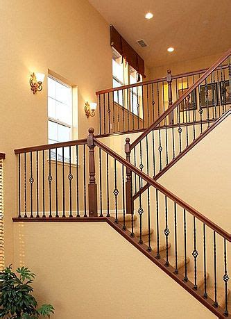 Staircase With Half Landing And Wrought Iron Spindles In Villa Ticino