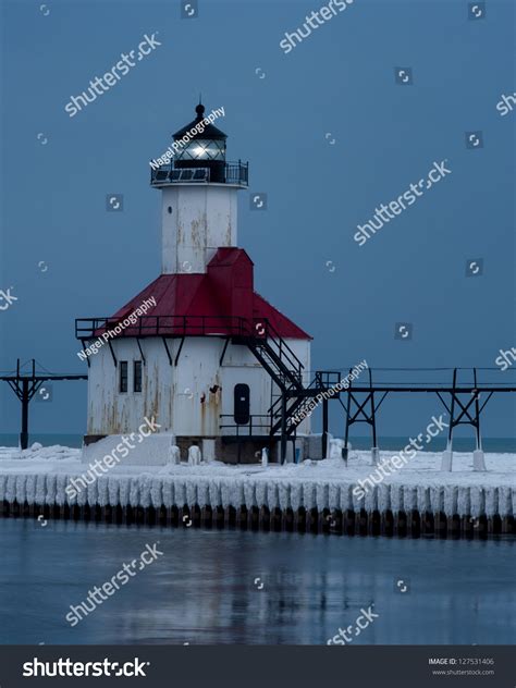 The St. Joseph North Pier Lighthouse Illuminated In Winter In Saint ...