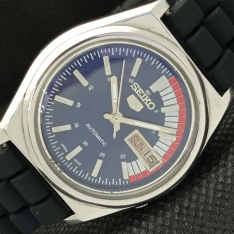 VINTAGE SEIKO 5 AUTOMATIC 7009A JAPAN MENS DAY DATE BLUE WATCH 594a