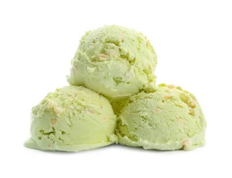 Scoop Of Delicious Pistachio Ice Cream On White Background Top View