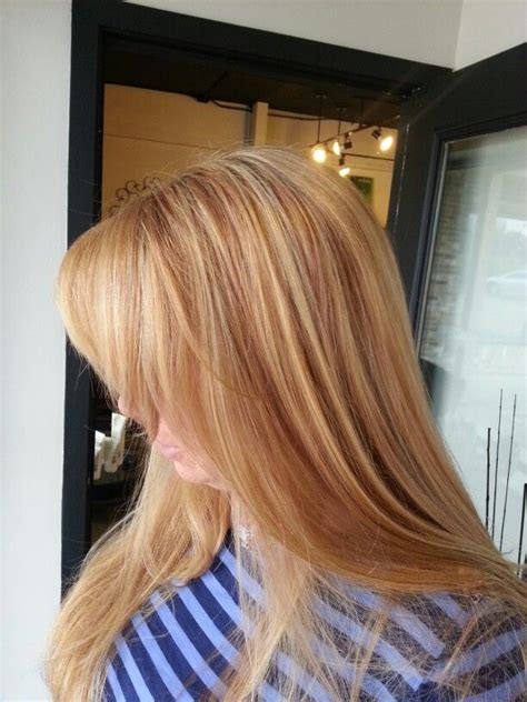 Natural Looking Highlights And Lowlights To Acheive A Strawberry Blonde Hair By Aveda