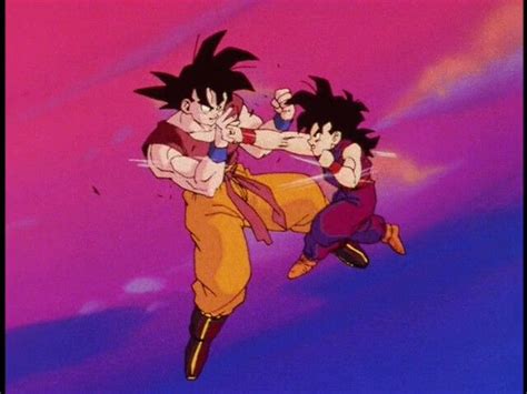 Two Young Gohan Fighting With Each Other In The Air Against A Purple