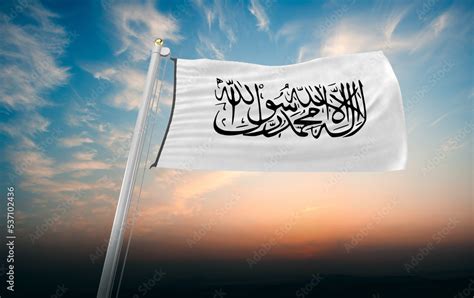 Waving flag of the Islamic Emirate of Afghanistan. Pole Flag in the ...