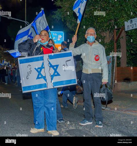 Haifa, Israel - March 11, 2023: Protest march with various signs and ...